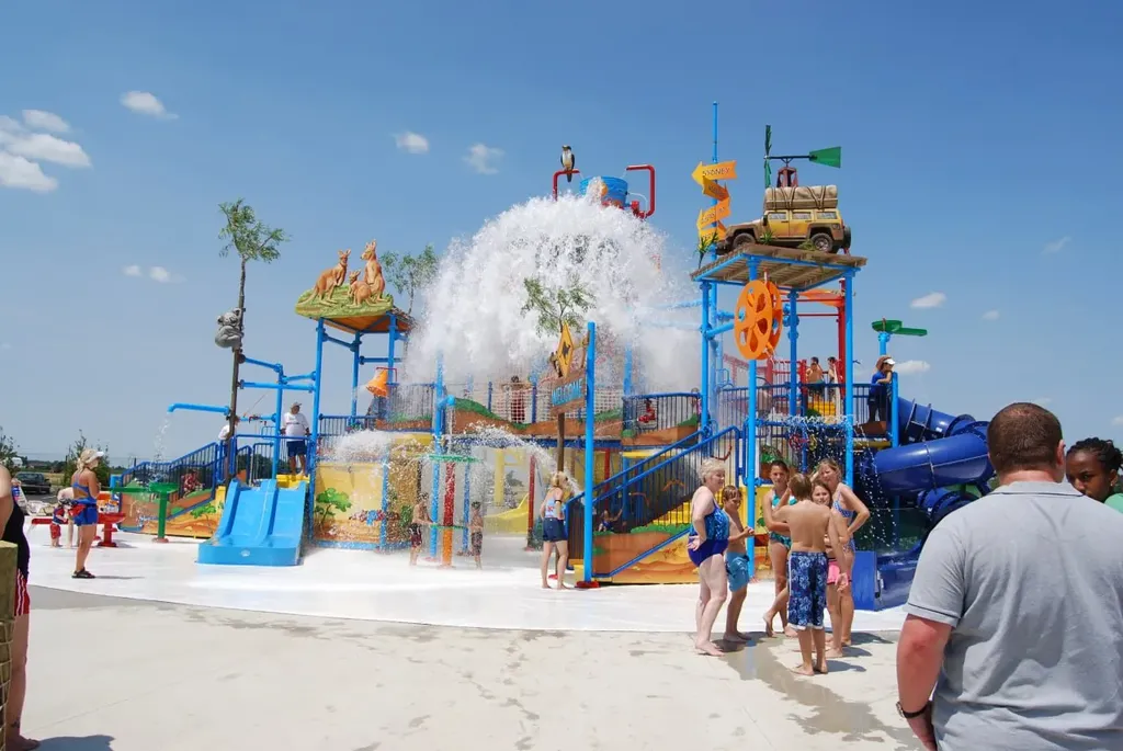 Jungle-themed water play structure with slides