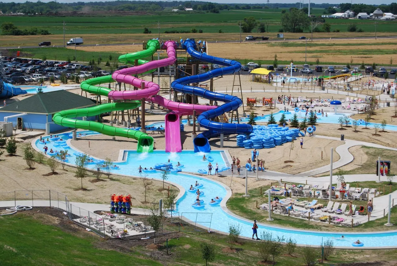 Aerial view of a water park with slides and wave pool